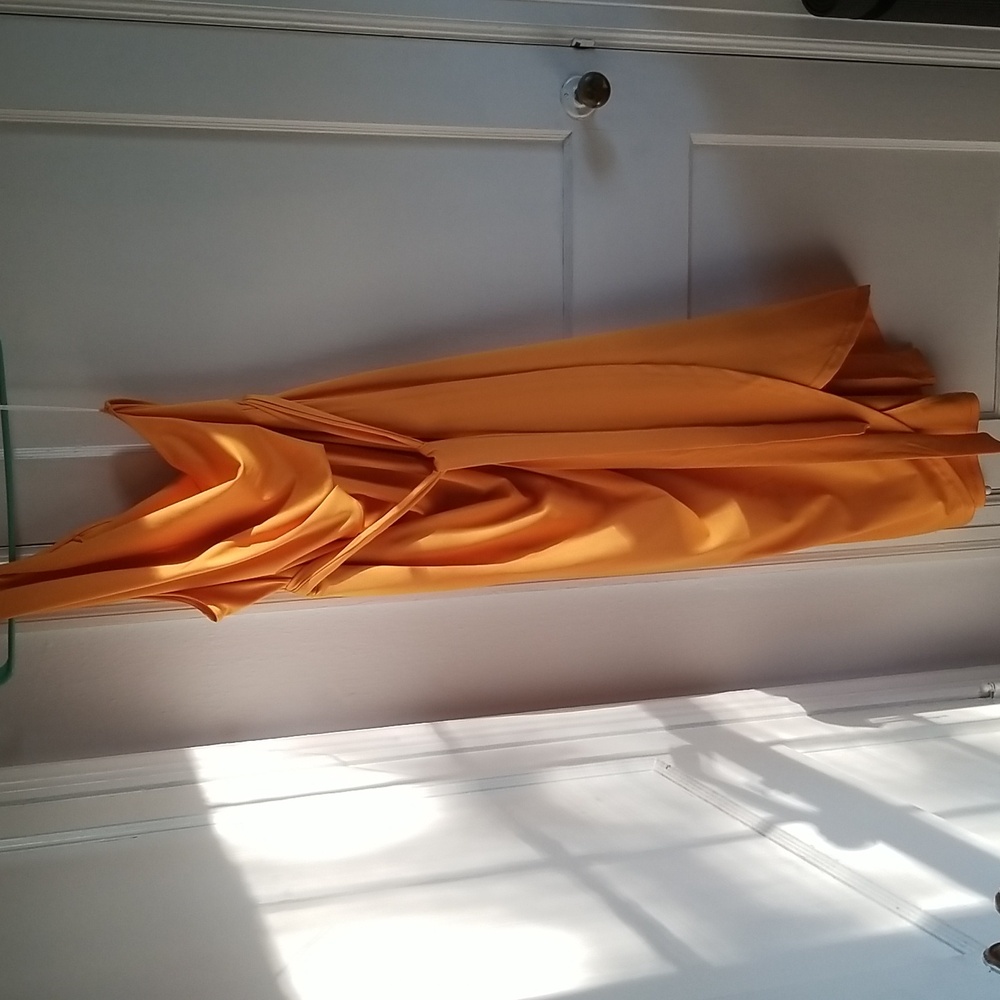 Yellow, one shoulder dress.